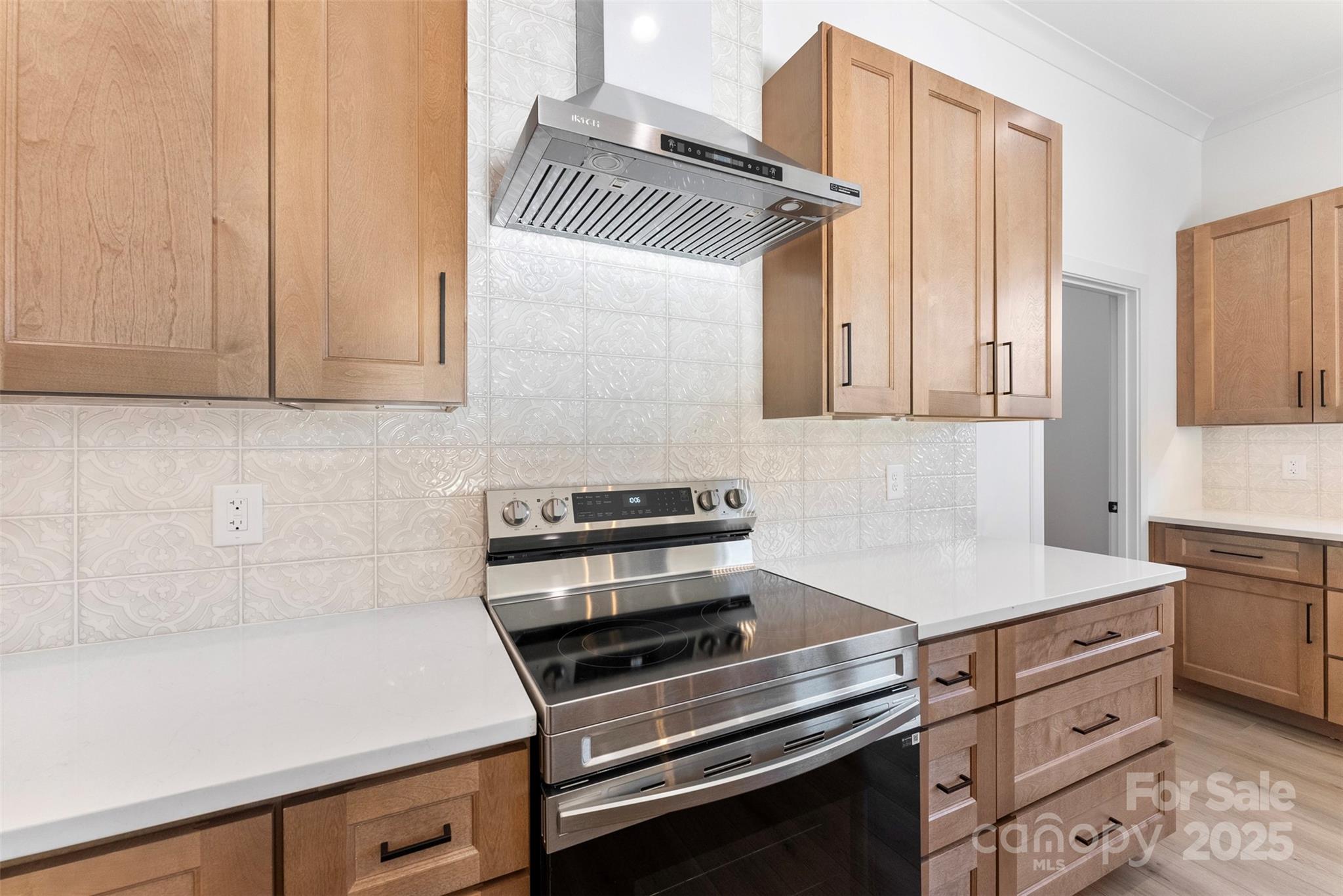 4005 Miller Road Salisbury, NC 28147 - Photo 6 of 46 a kitchen with granite countertop a stove and a sink