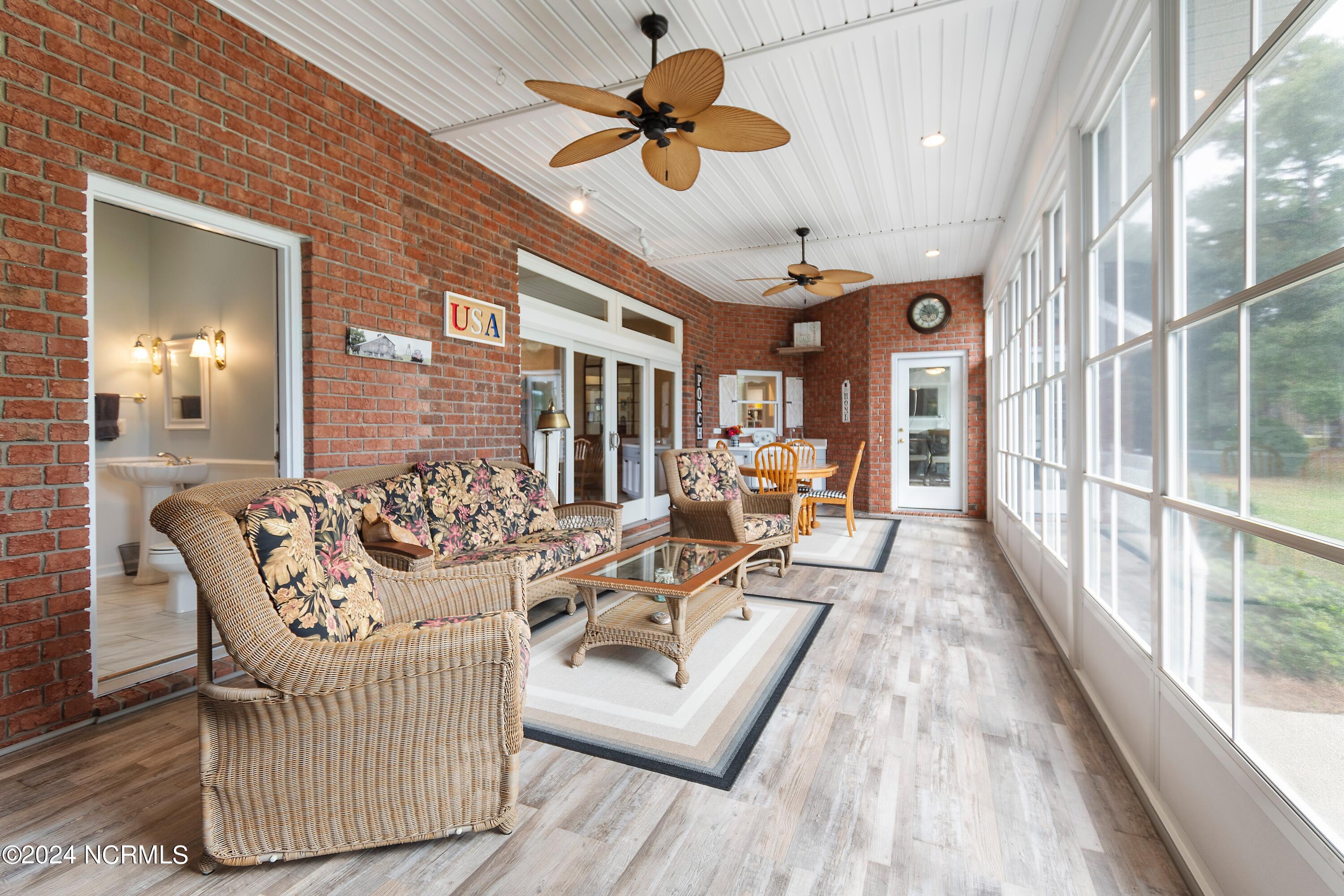 181 Rice Mill Circle Sunset Beach, NC 28468 - Photo 56 of 87 Three-season room