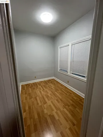 view of empty room with wooden floor