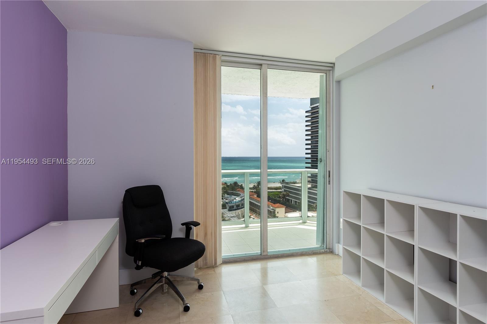 5900 Collins Avenue, Unit 1207 Miami Beach, FL 33140 - Photo 18 of 25 a living room with furniture and a window