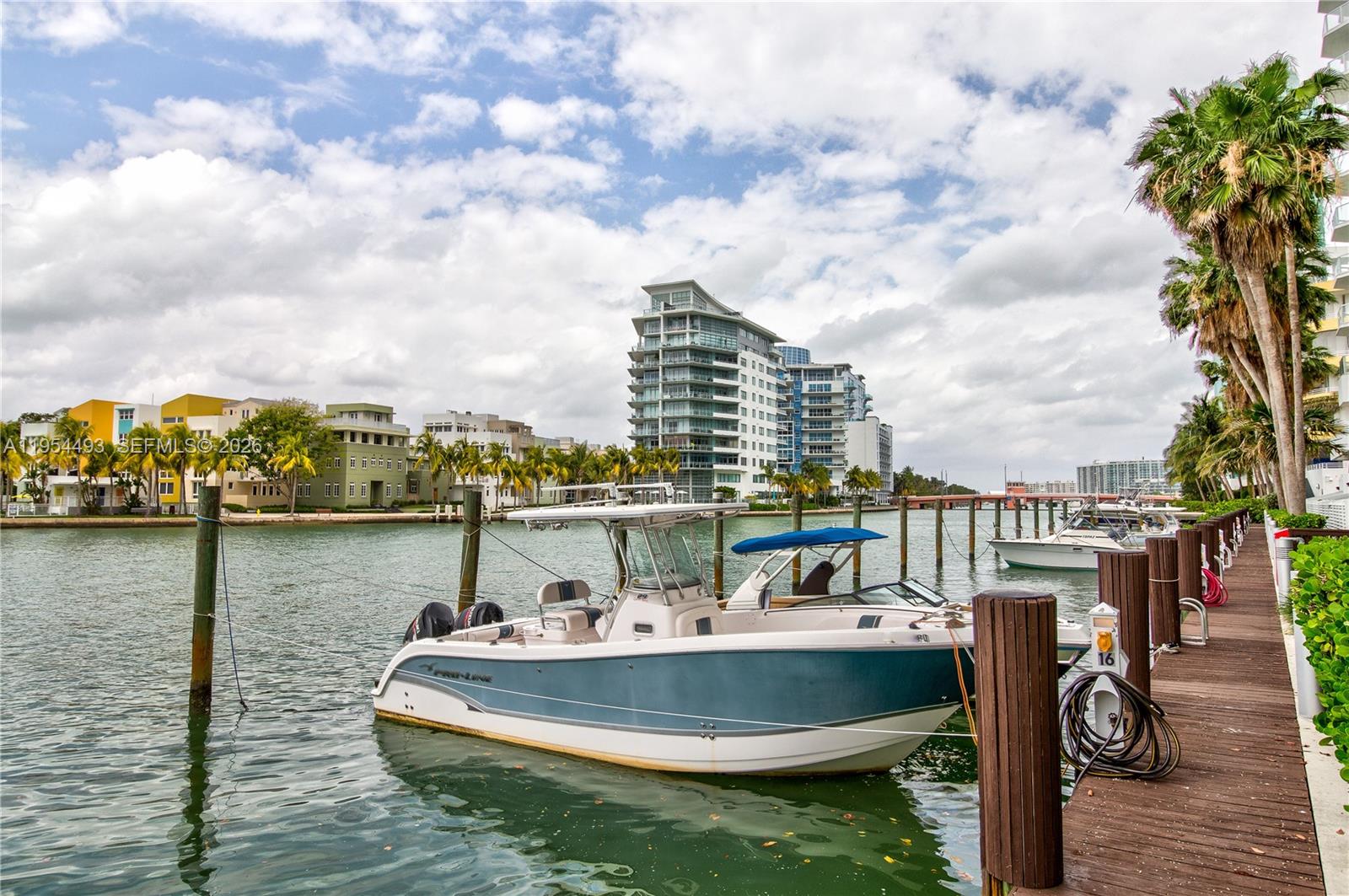 5900 Collins Avenue, Unit 1207 Miami Beach, FL 33140 - Photo 24 of 25 a view of a lake with tall buildings