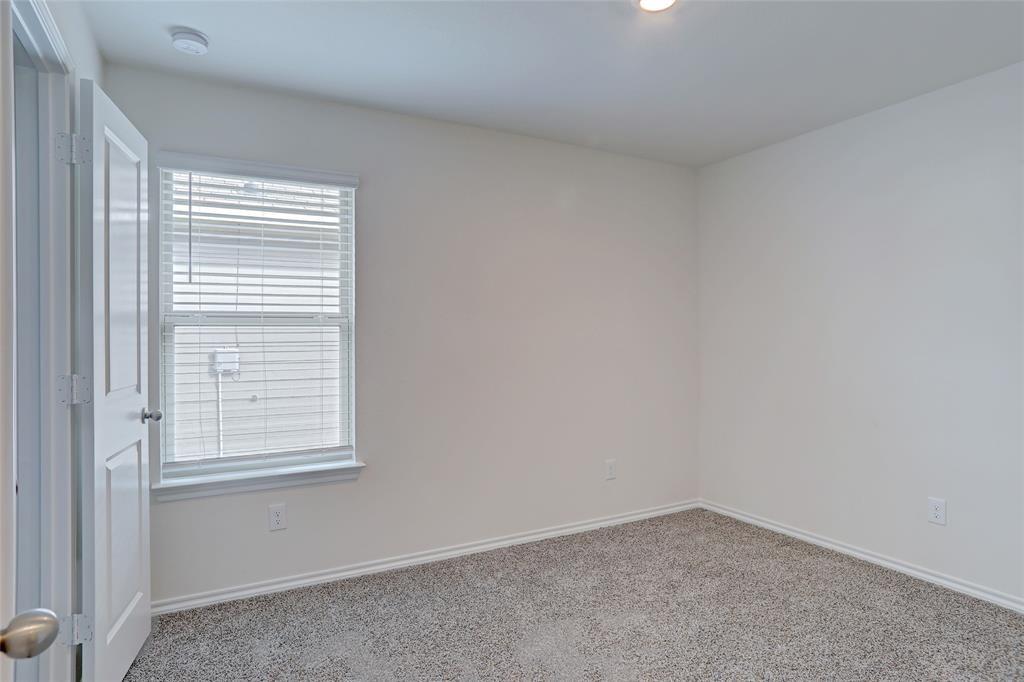 6517 Waterfall Lane Princeton, TX 75407 - Photo 12 of 19 a view of an empty room with a window