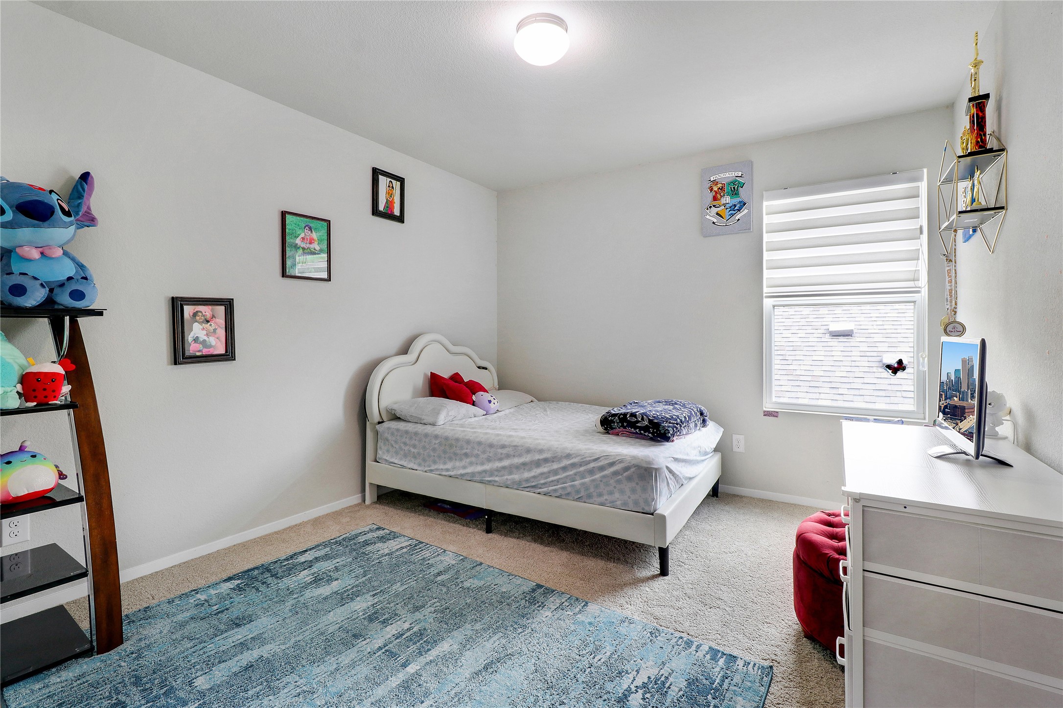 33 Bent Trl Lane Georgetown, TX 78628 - Photo 22 of 40 a bedroom with furniture and a window