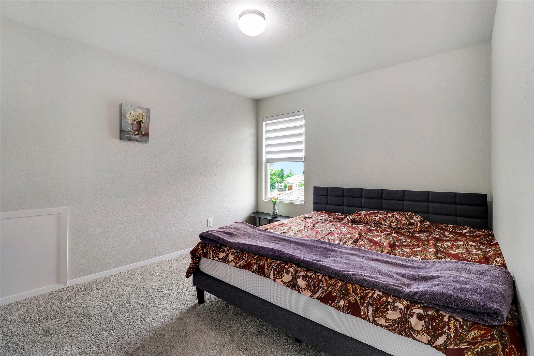 33 Bent Trl Lane Georgetown, TX 78628 - Photo 26 of 40 a bed sitting in a bedroom next to a window