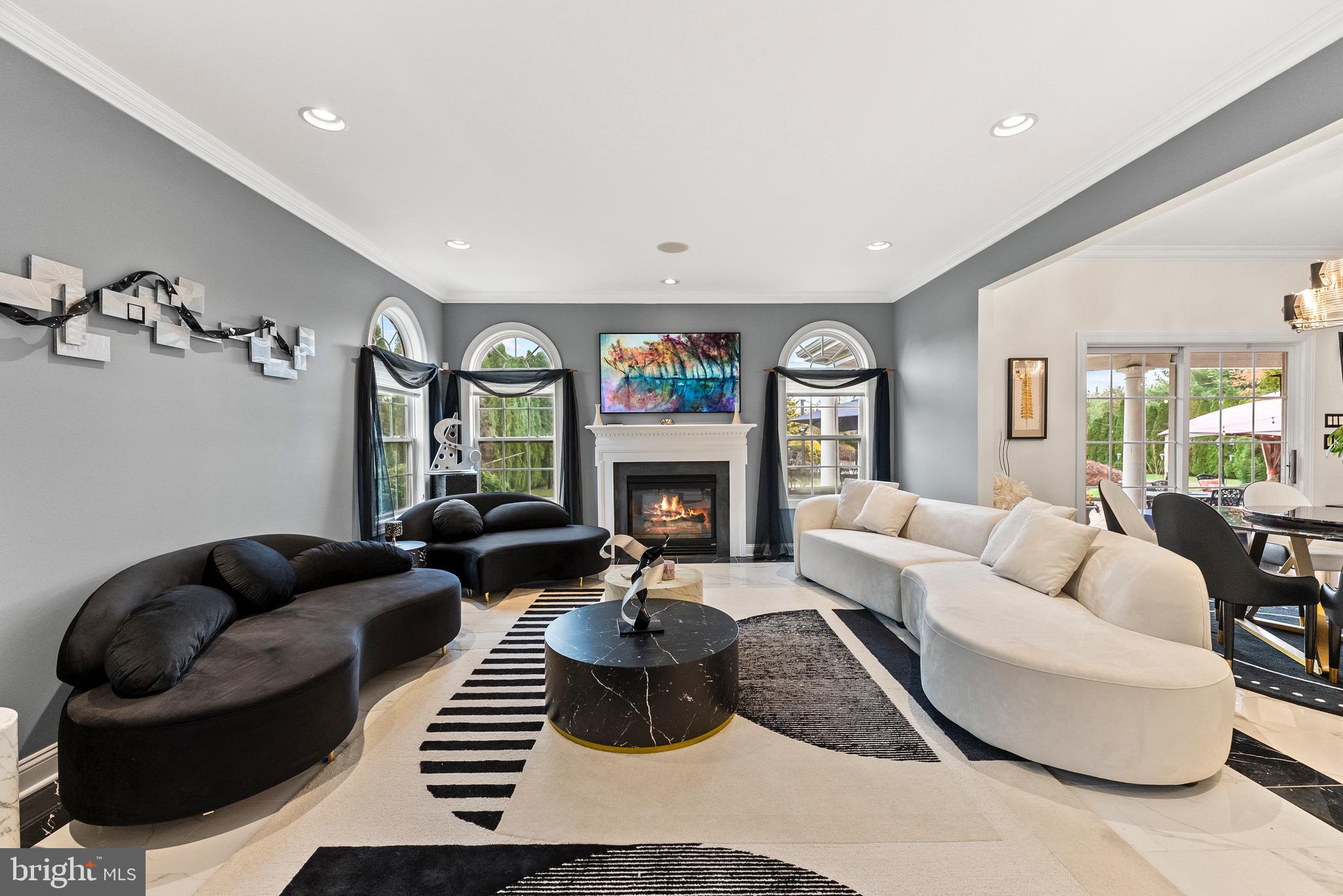 8 Sherwood Lane Columbus, NJ 08022 - Photo 21 of 85 a living room with furniture and a fireplace