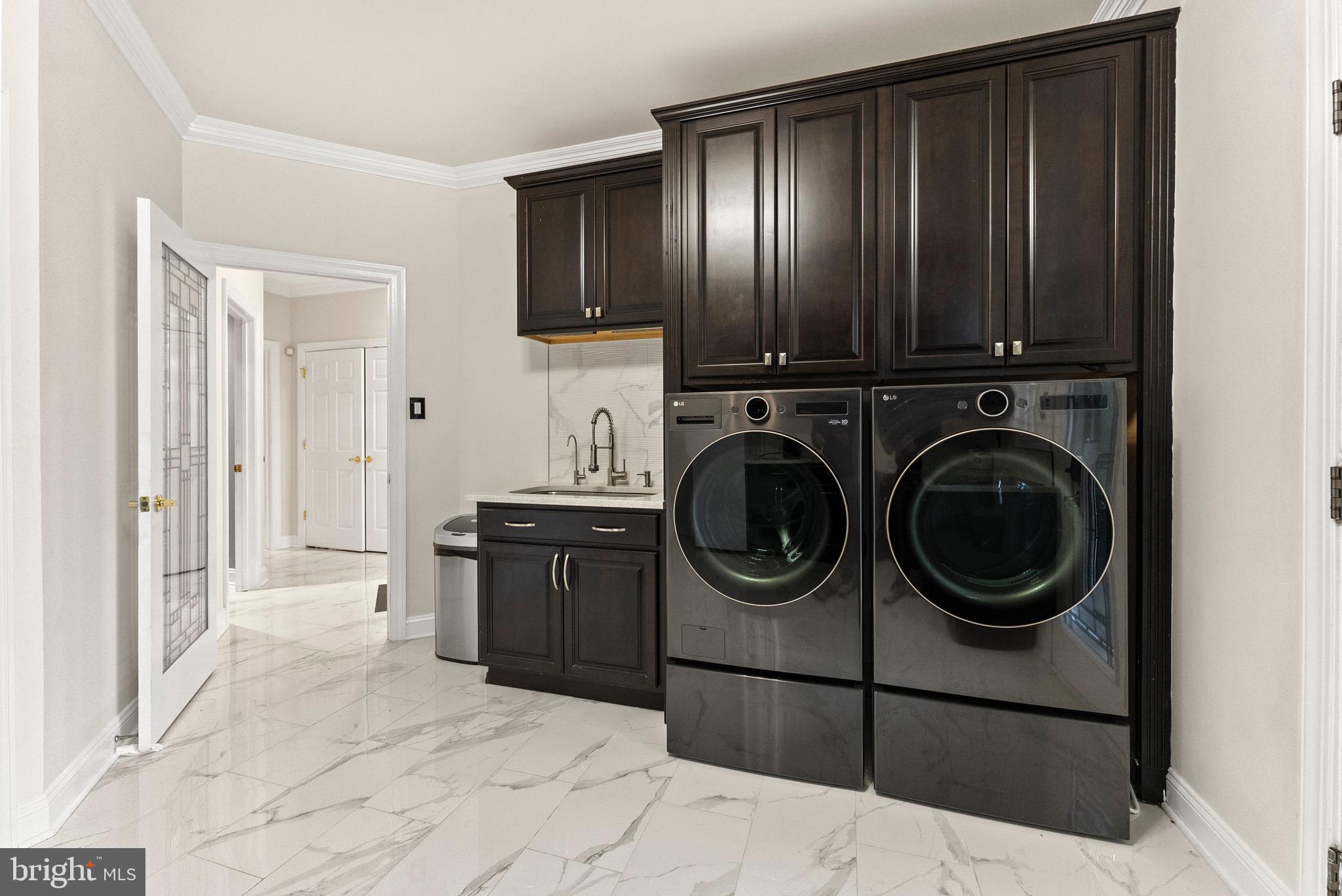 8 Sherwood Lane Columbus, NJ 08022 - Photo 37 of 85 a view of a kitchen with stainless steel appliances granite countertop wooden cabinets a washer and dryer