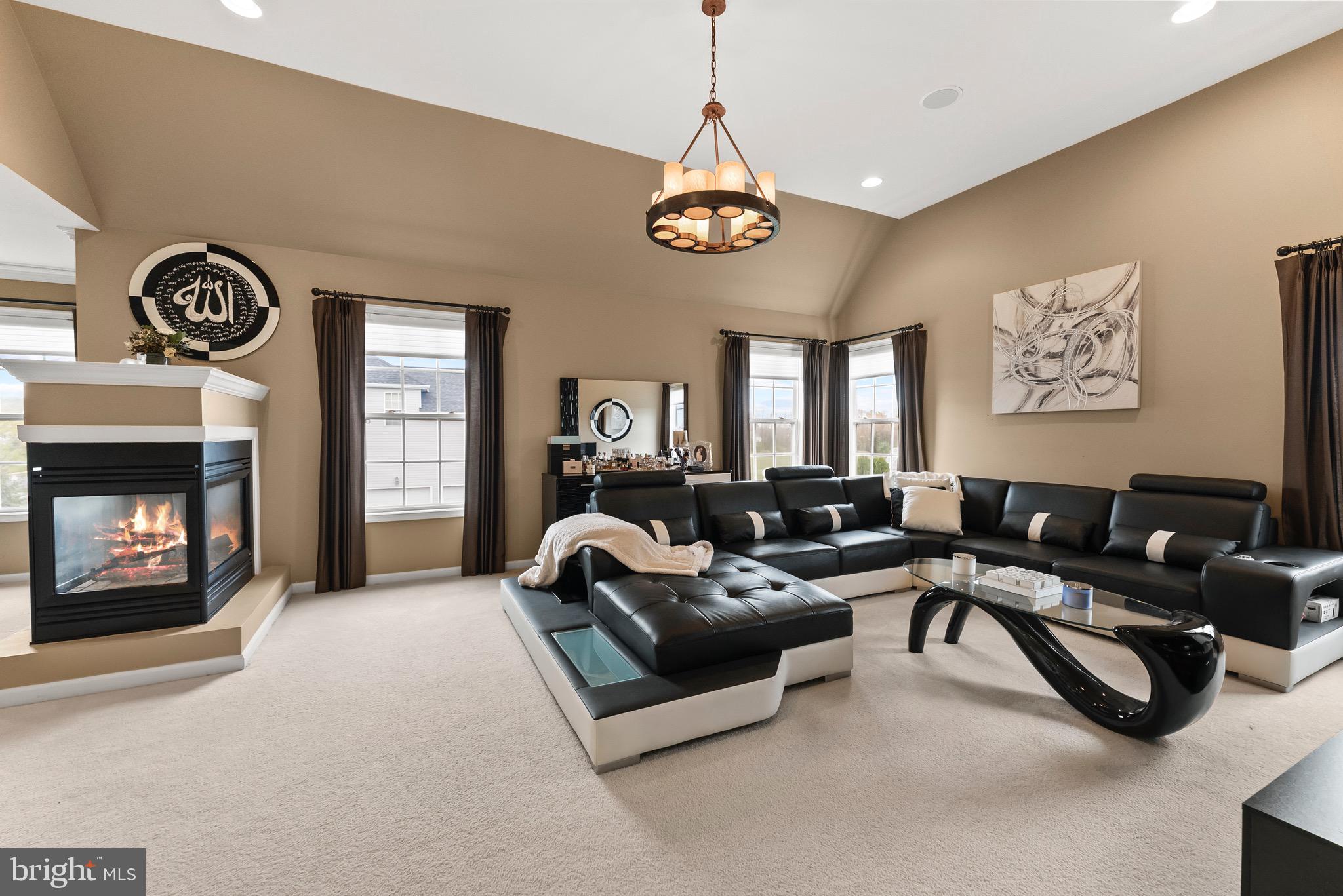 8 Sherwood Lane Columbus, NJ 08022 - Photo 46 of 85 a living room with furniture a fireplace and a window