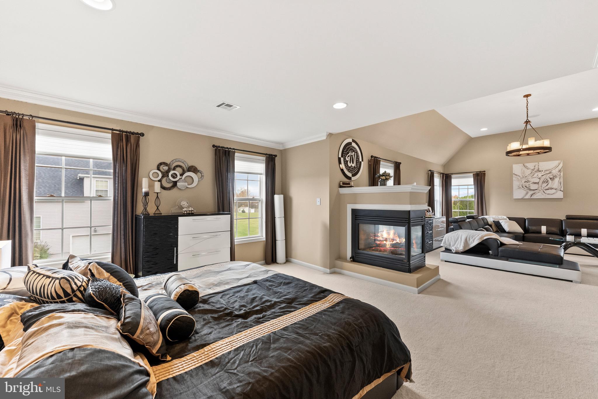 8 Sherwood Lane Columbus, NJ 08022 - Photo 47 of 85 a bedroom with a bed and a fireplace