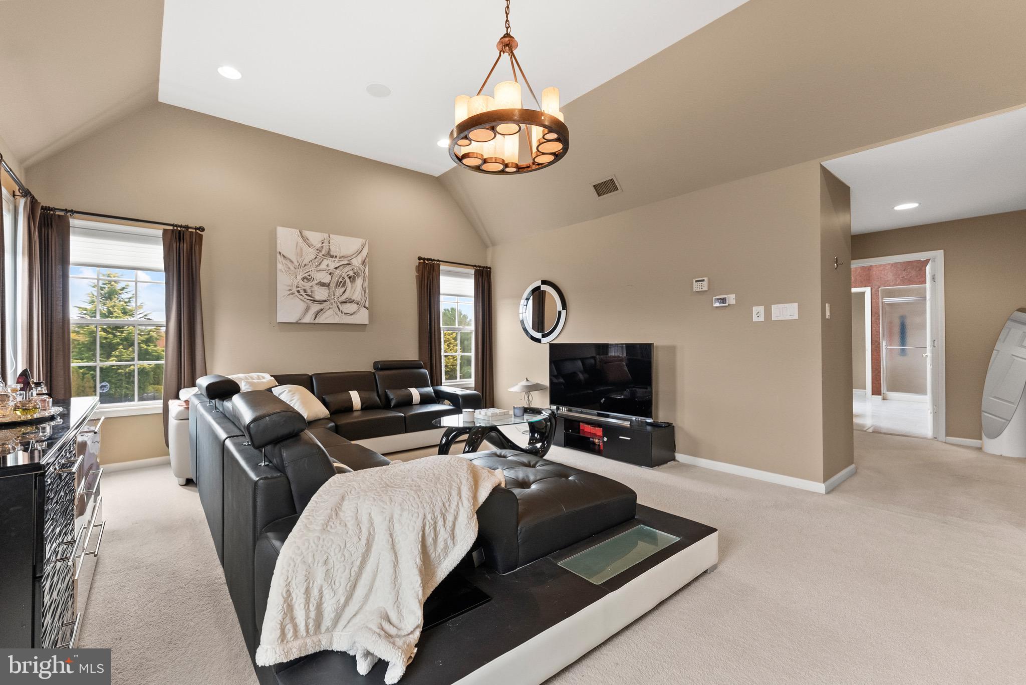 8 Sherwood Lane Columbus, NJ 08022 - Photo 50 of 85 a living room with furniture a flat screen tv and a large window