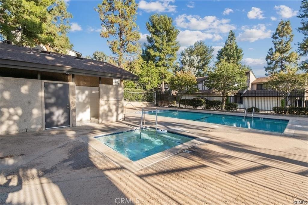 10831 Roycroft Street, Unit 72 Sun Valley, CA 91352 - Photo 29 of 30 a view of a house with a yard