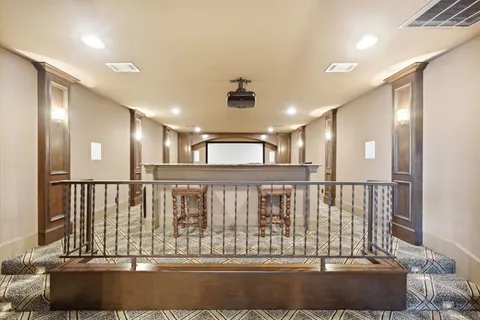 a view of staircase with white walls