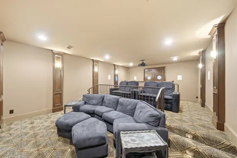 a living room with furniture and a table