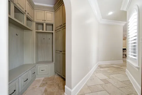 a utility room with a sink dryer and washer