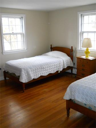 41 Gregory Road Wakefield, MA 01880 - Photo 17 of 24 a bedroom with a bed and window