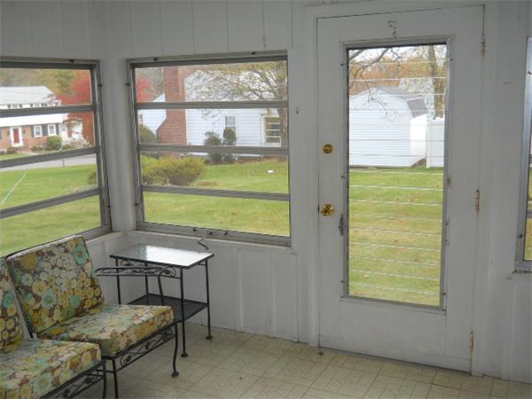 41 Gregory Road Wakefield, MA 01880 - Photo 20 of 24 a view of a livingroom with furniture and a window