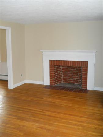 41 Gregory Road Wakefield, MA 01880 - Photo 9 of 24 a view of an empty room with wooden floor
