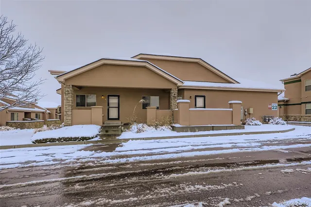 a front view of a house with entertaining space