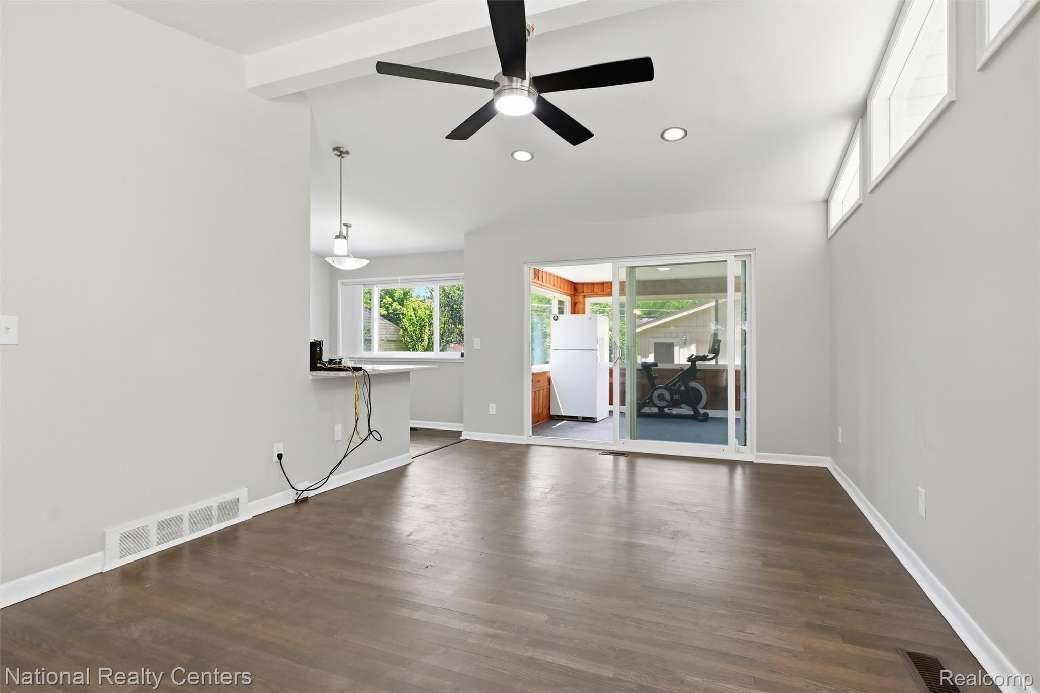 17159 Rougeway Street Livonia, MI 48152 - Photo 8 of 36 Spacious interior with dark wood-finish flooring, recessed lighting, and a modern ceiling fan