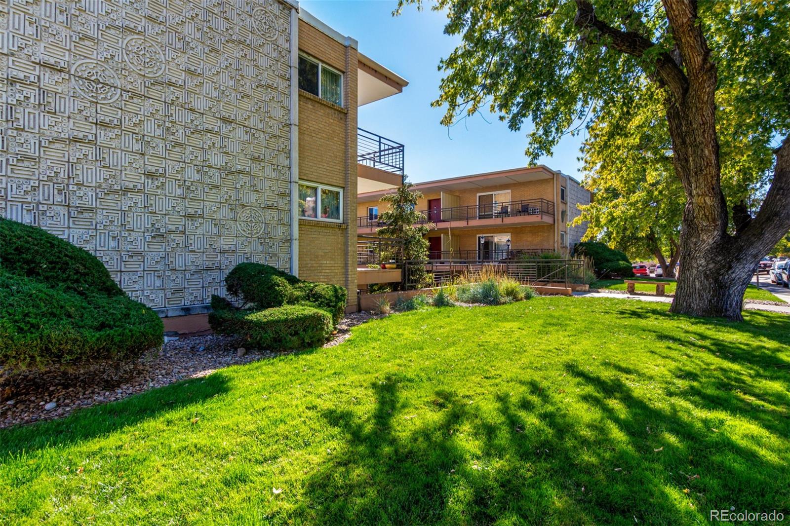 830 20th Street, Unit 206 Boulder, CO 80302 - Photo 1 of 27 a view of a chairs in front of house