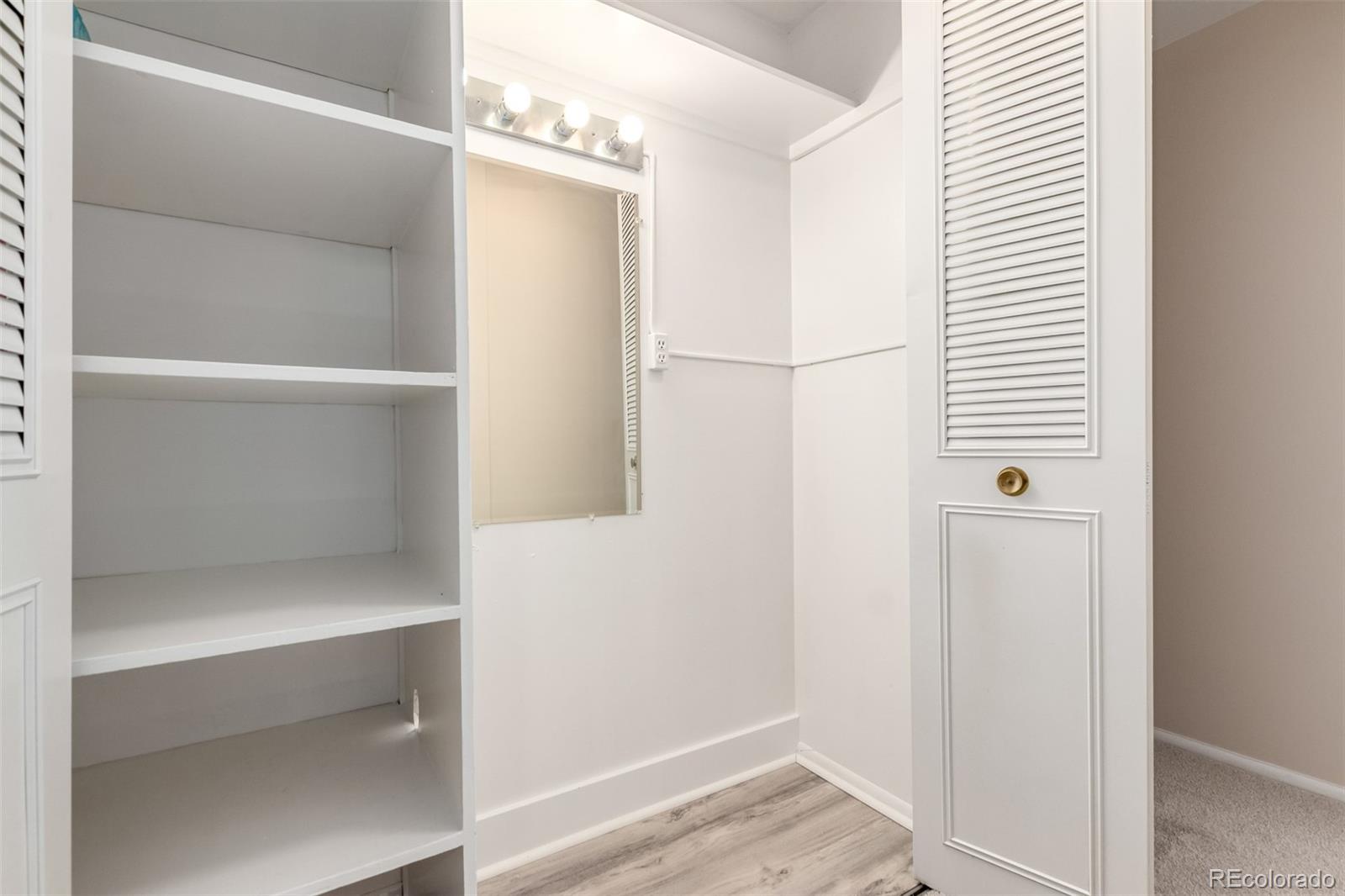 830 20th Street, Unit 206 Boulder, CO 80302 - Photo 23 of 27 a view of an entryway with wooden floor