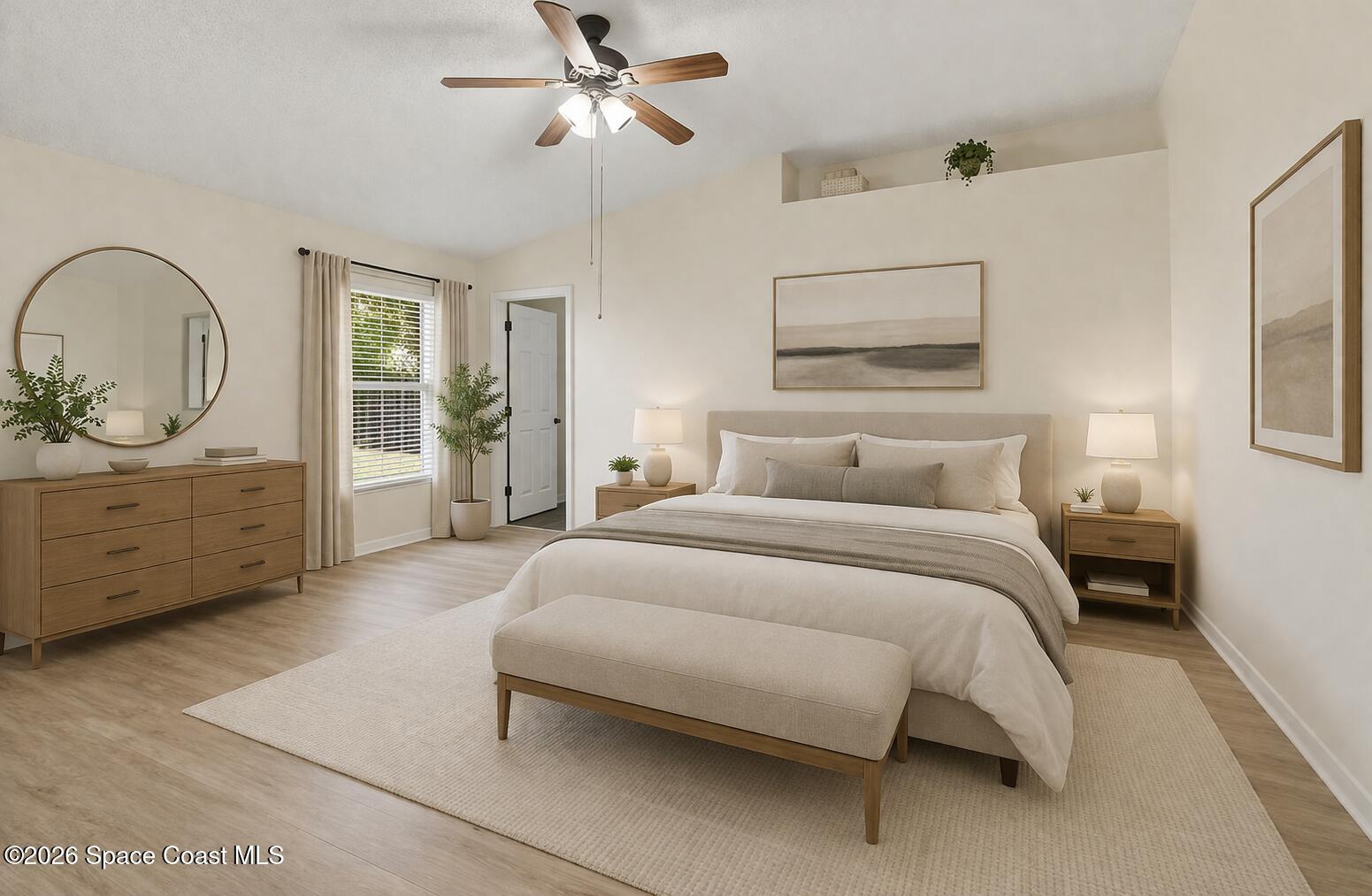 2547 Deercroft Drive Melbourne, FL 32940 - Photo 15 of 35 a bedroom with a large bed and a chandelier