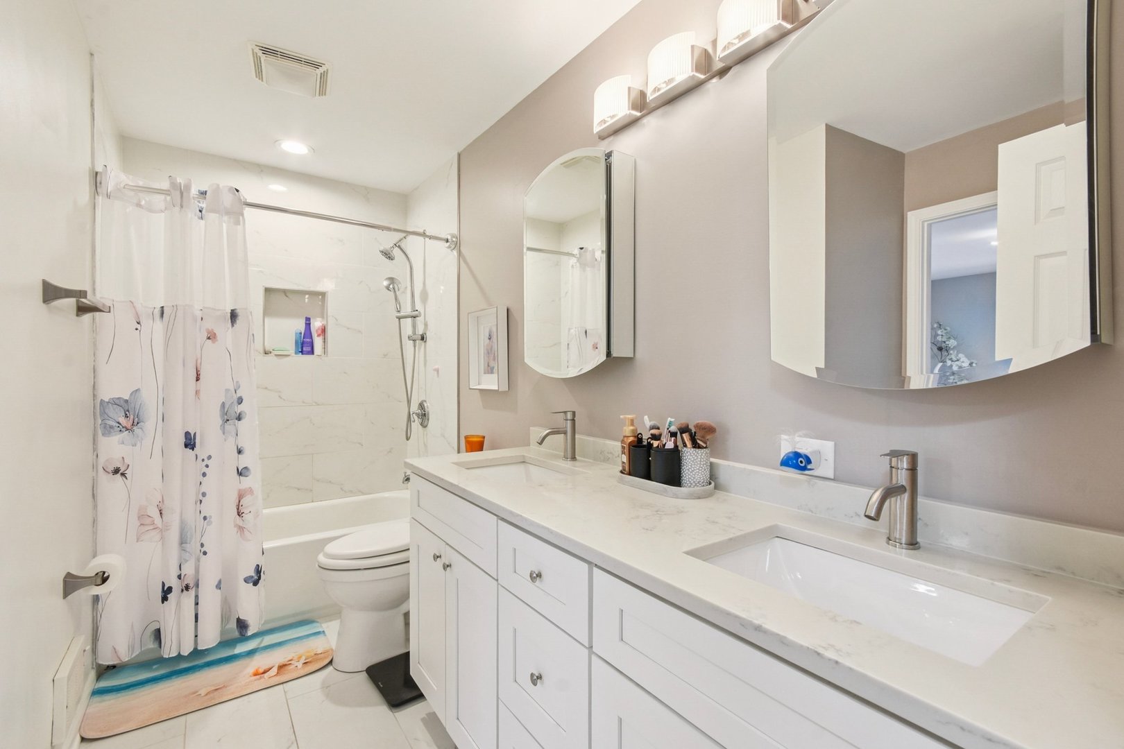 1860 Burr Ridge Drive Hoffman Estates, IL 60192 - Photo 13 of 34 a bathroom with a double vanity sink toilet mirror and shower