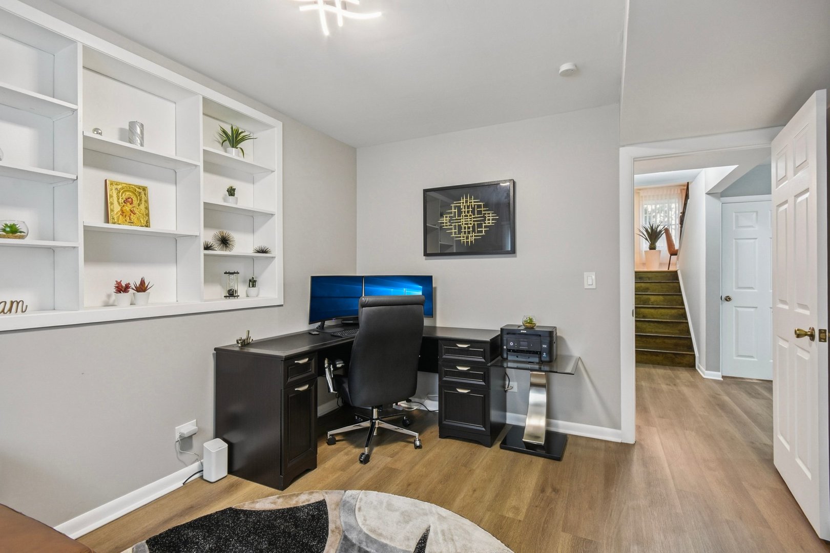 1860 Burr Ridge Drive Hoffman Estates, IL 60192 - Photo 22 of 34 a view of a workspace with furniture and wooden floor