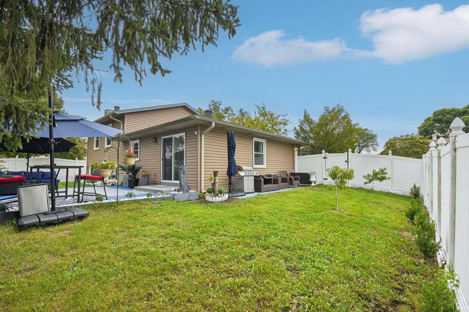 1860 Burr Ridge Drive Hoffman Estates, IL 60192 - Photo 29 of 34 a view of a house with a yard porch and sitting area