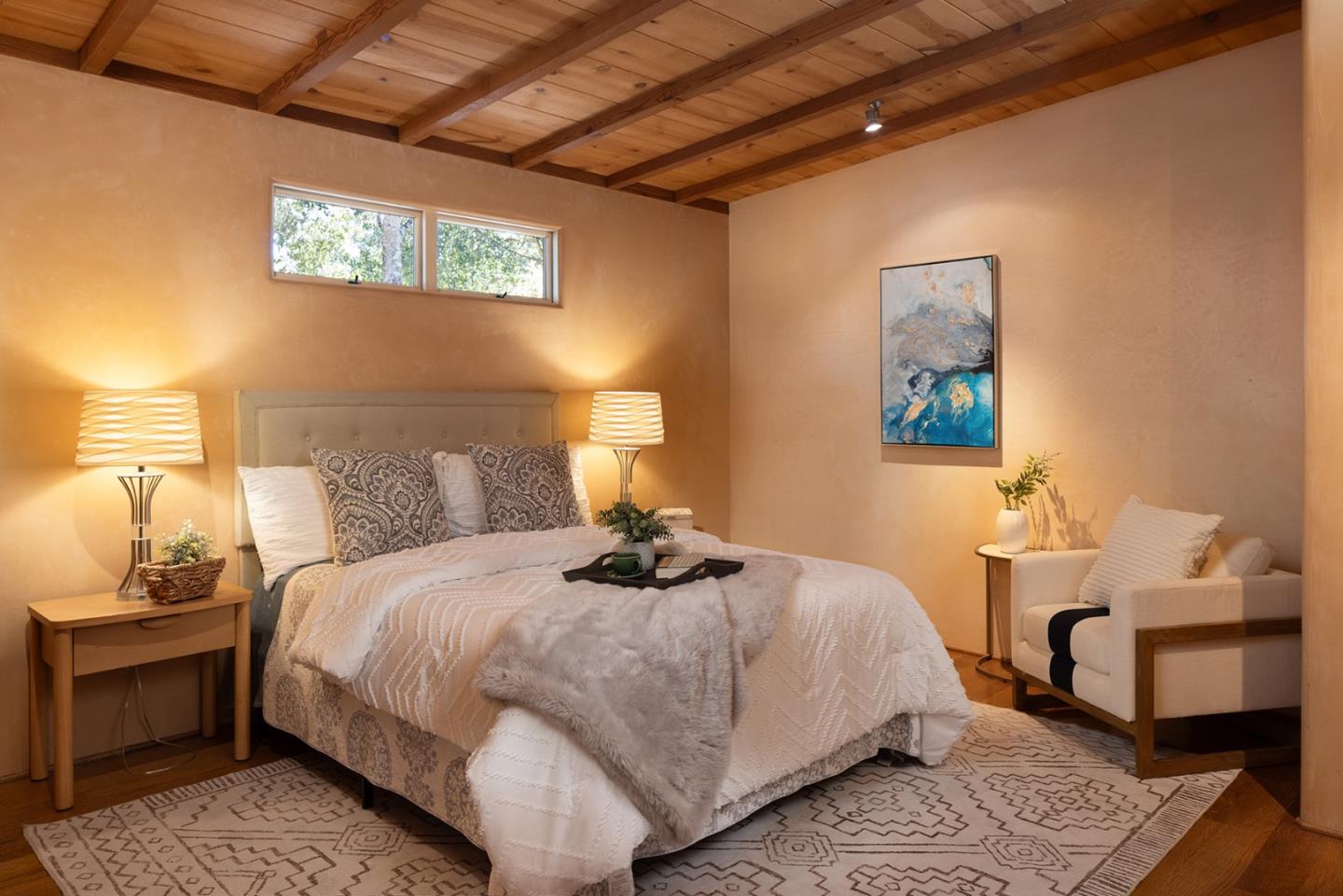 1318 Chamisal Way Pebble Beach, CA 93953 - Photo 17 of 24 a bedroom with a bed and wooden floor