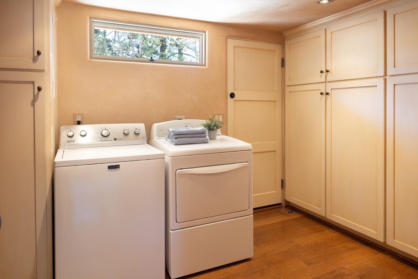 1318 Chamisal Way Pebble Beach, CA 93953 - Photo 18 of 24 a utility room with dryer and washer