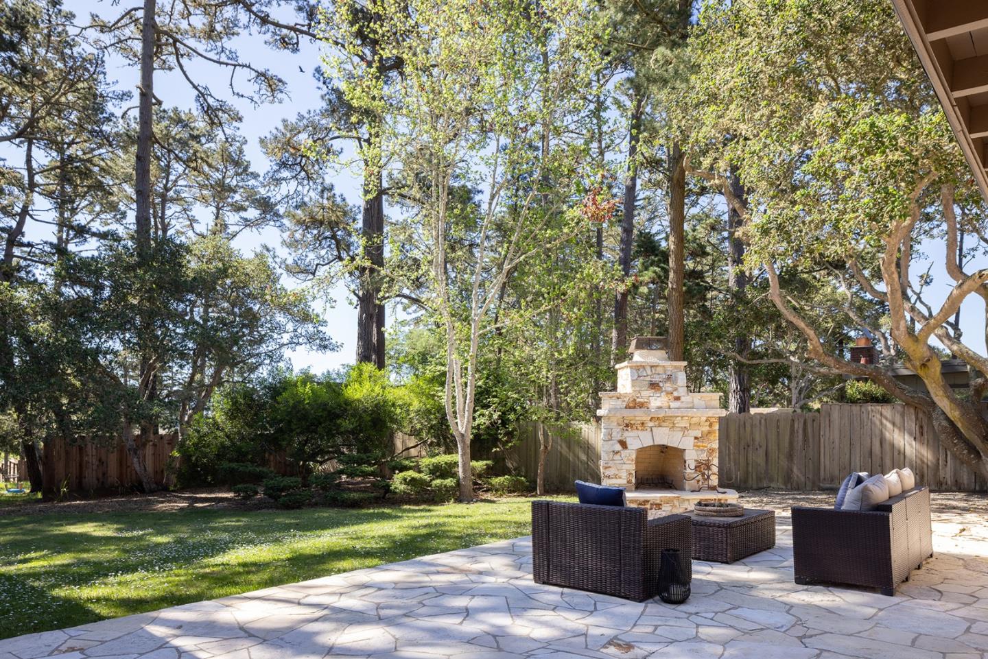 1318 Chamisal Way Pebble Beach, CA 93953 - Photo 20 of 24 a view of a garden with plants and trees