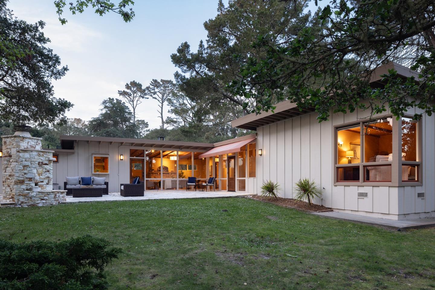 1318 Chamisal Way Pebble Beach, CA 93953 - Photo 2 of 24 a front view of house with yard and outdoor seating