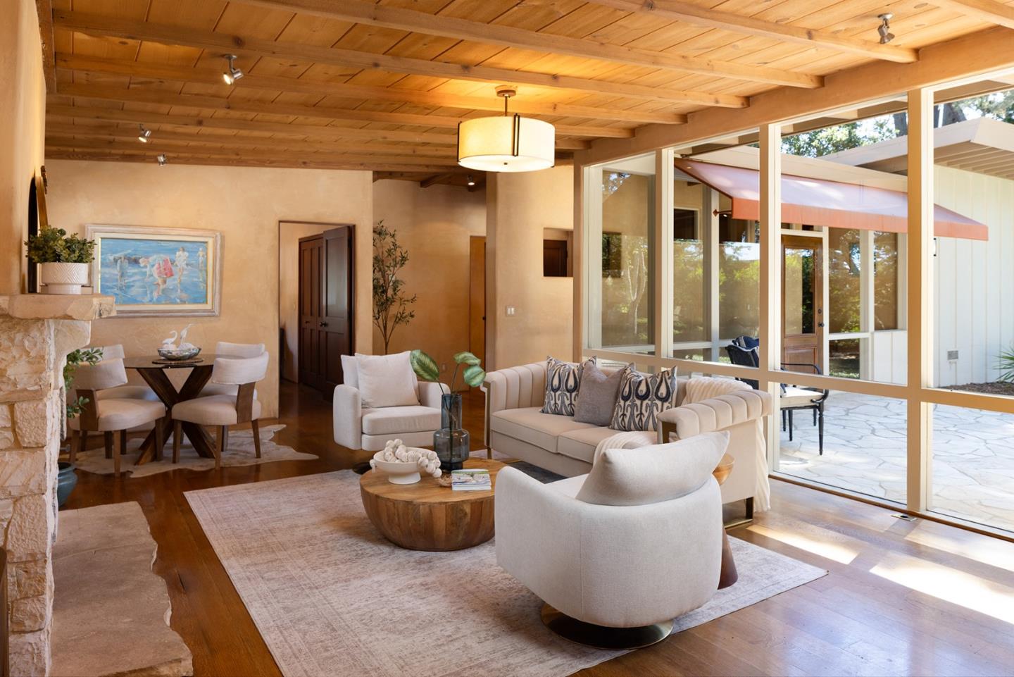 1318 Chamisal Way Pebble Beach, CA 93953 - Photo 5 of 24 a living room with furniture and a chandelier