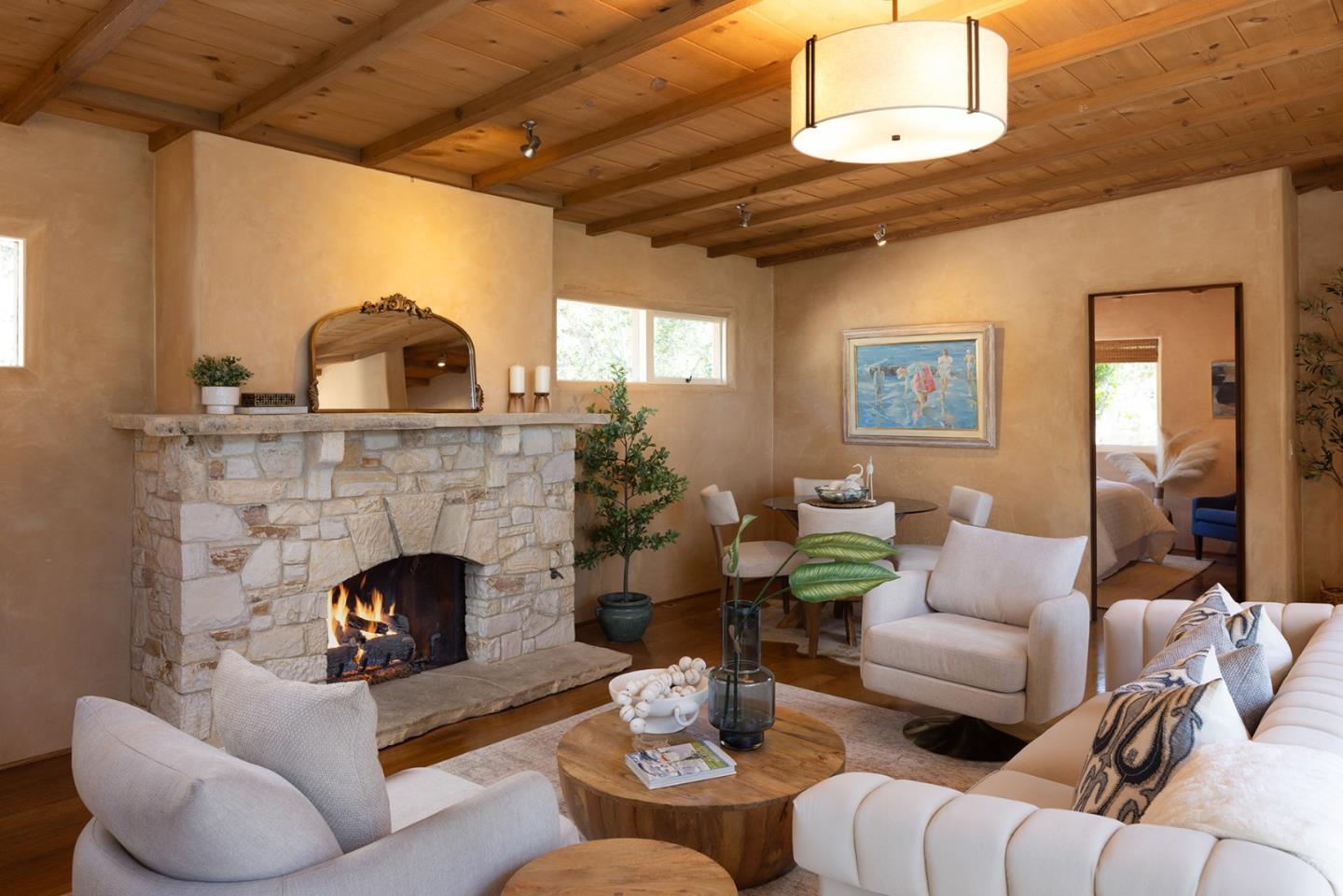 1318 Chamisal Way Pebble Beach, CA 93953 - Photo 6 of 24 a living room with furniture and a fireplace