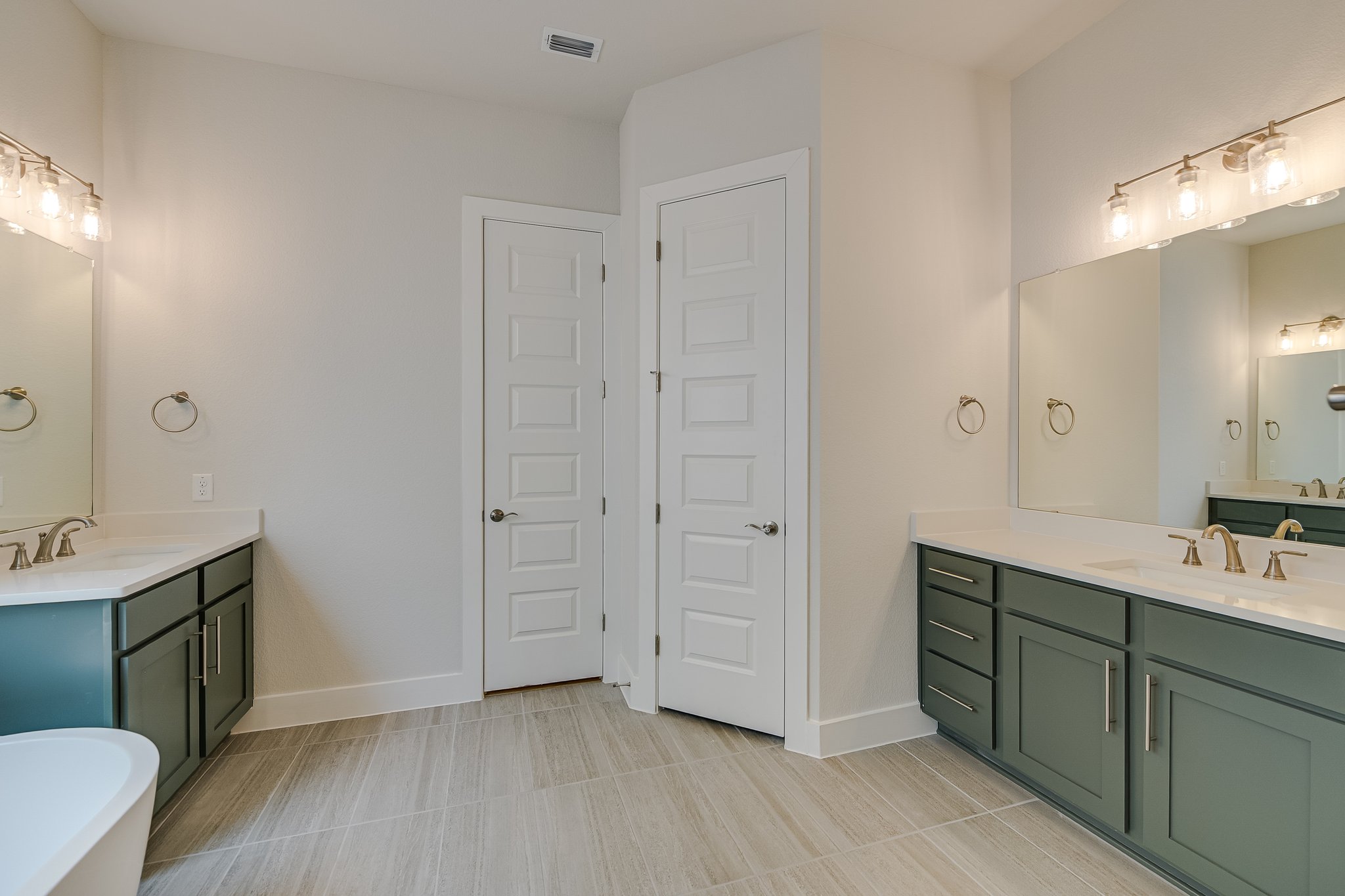 17306 Hattie Trace Austin, TX 78738 - Photo 16 of 37 a bathroom with a sink and a mirror