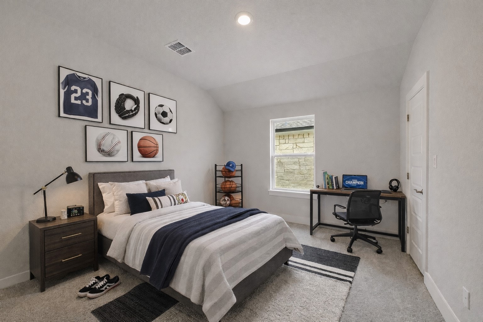 17306 Hattie Trace Austin, TX 78738 - Photo 20 of 37 a bedroom with a bed and a table in it