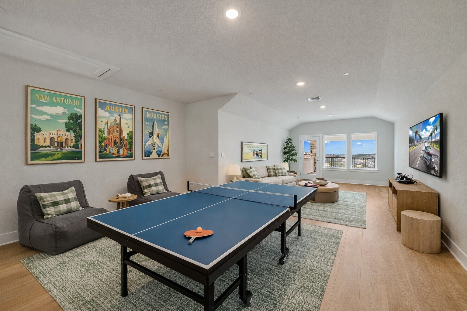 17306 Hattie Trace Austin, TX 78738 - Photo 25 of 37 a living room with furniture flat screen tv and a table