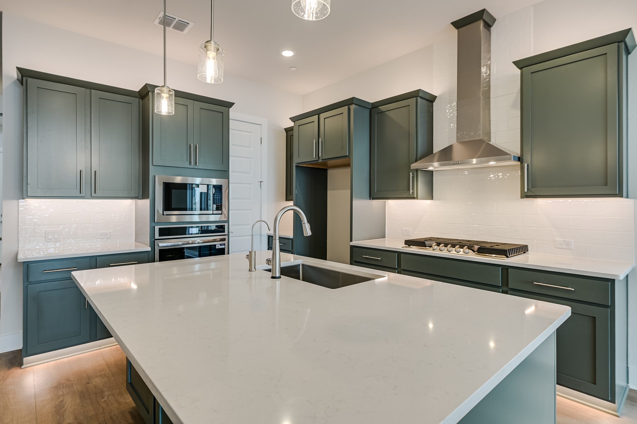 17306 Hattie Trace Austin, TX 78738 - Photo 6 of 37 a kitchen with stainless steel appliances a refrigerator and a stove