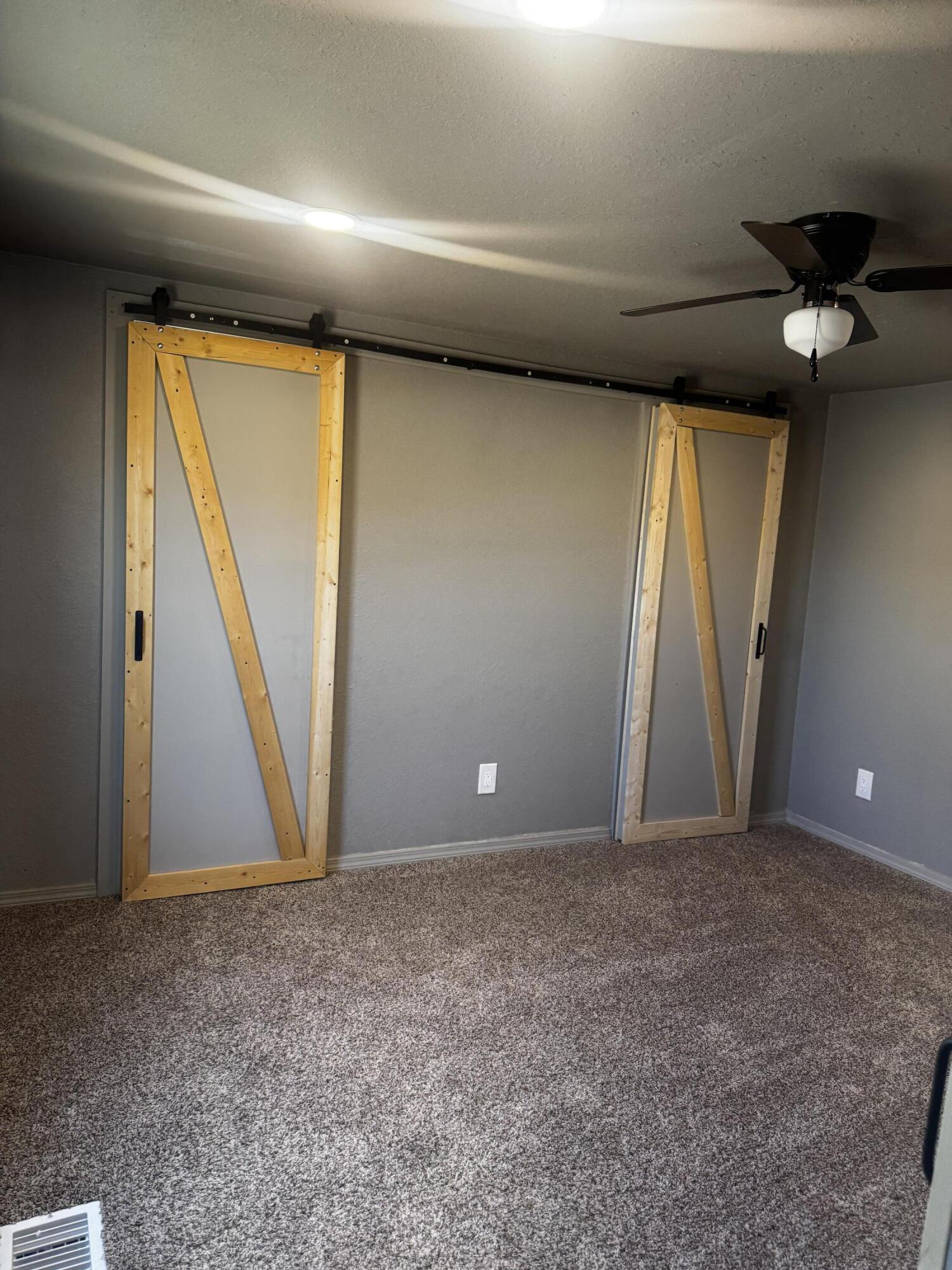 1128 Alaska Road Levelland, TX 79336 - Photo 16 of 20 a view of an empty room with a window
