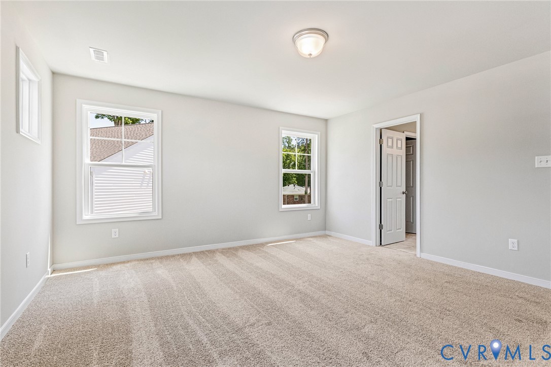 10010 Cool Spring Road Mechanicsville, VA 23116 - Photo 8 of 13 Carpeted flooring, white walls, two double-hung wi