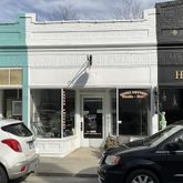 a car parked in front of a building