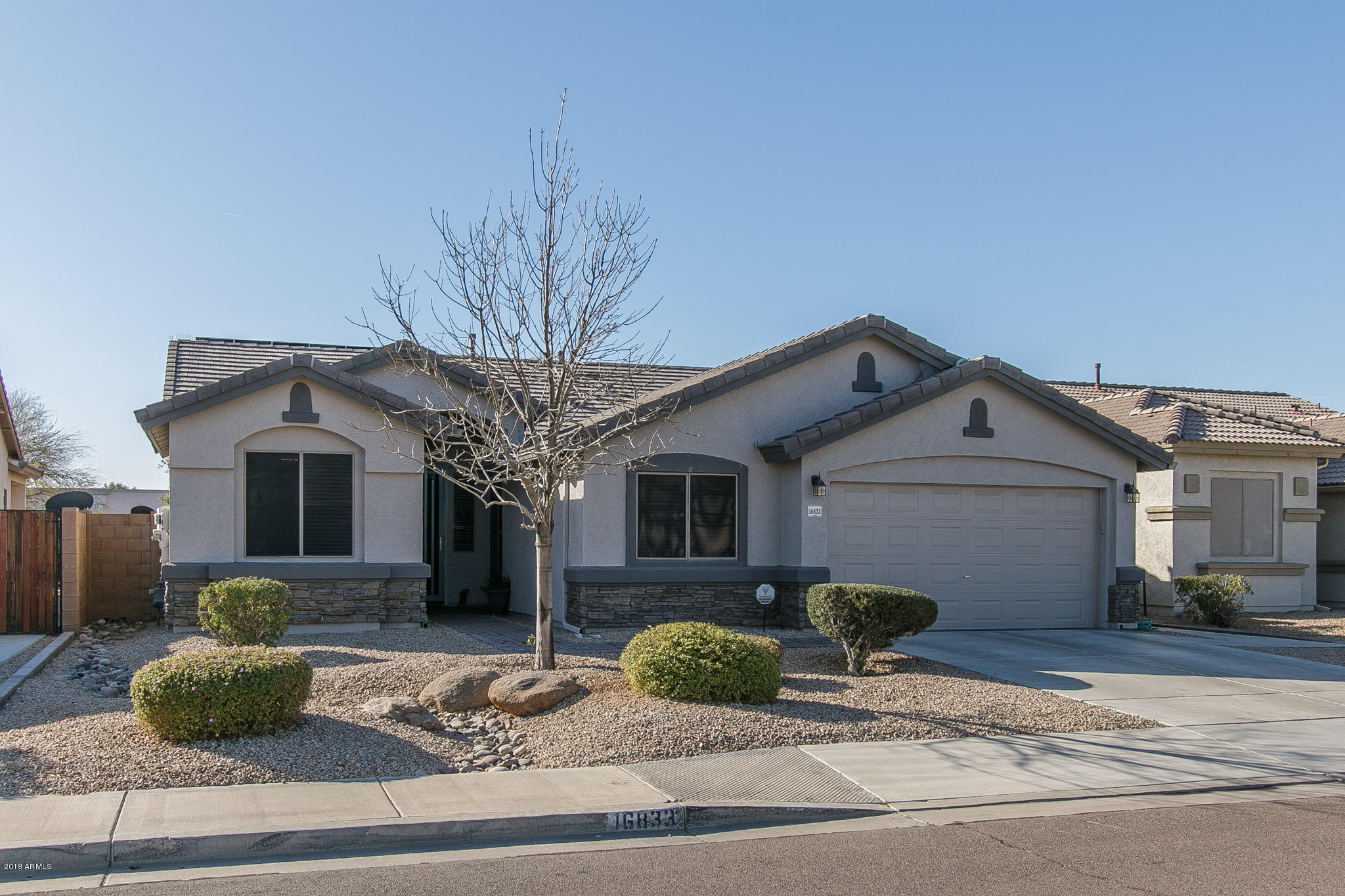 16833 West Southampton Road Surprise, AZ 85374 - Photo 1 of 30 1) FRONT OF HOME