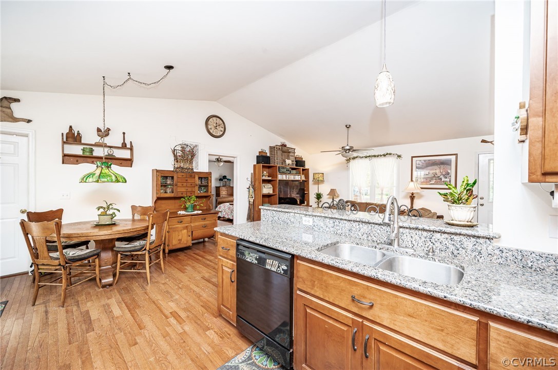 14490 Meade Road Amelia Court House, VA 23002 - Photo 12 of 25 a very nice looking kitchen with granite countertop a sink and chairs