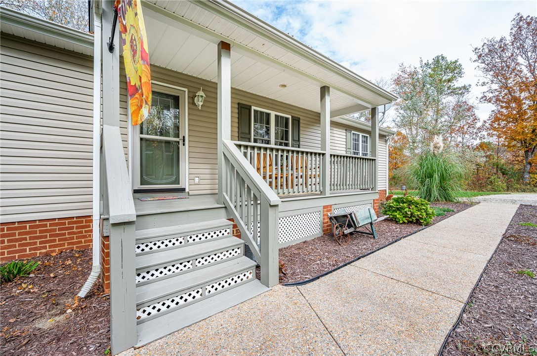 14490 Meade Road Amelia Court House, VA 23002 - Photo 4 of 25 a front view of a house with a garden