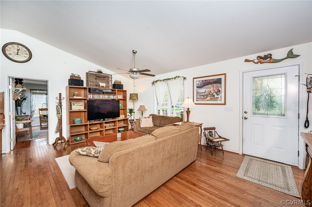 14490 Meade Road Amelia Court House, VA 23002 - Photo 7 of 25 a living room with furniture and a flat screen tv