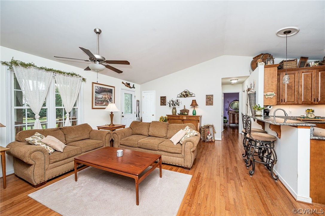 14490 Meade Road Amelia Court House, VA 23002 - Photo 8 of 25 a living room with furniture and wooden floor