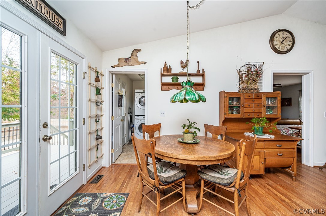 14490 Meade Road Amelia Court House, VA 23002 - Photo 9 of 25 a view of a dining room with furniture window and wooden floor