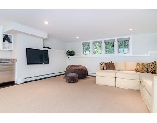35 Bradford Road Wellesley, MA 02481 - Photo 19 of 26 a living room with furniture and a flat screen tv