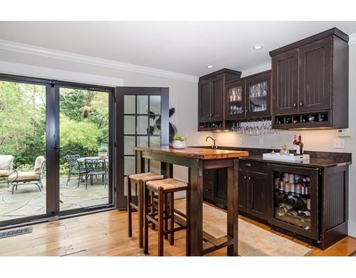 35 Bradford Road Wellesley, MA 02481 - Photo 6 of 26 a kitchen with a table chairs and a window
