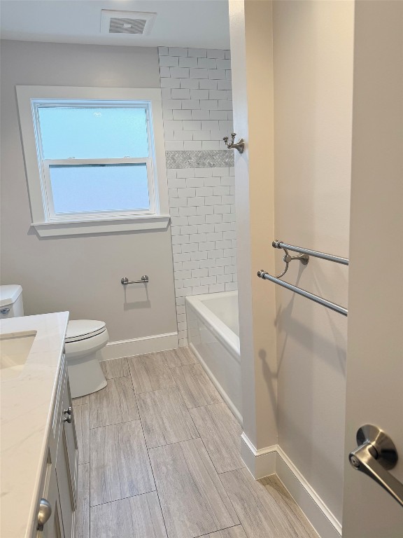 13610 Taylorcrest Road Houston, TX 77079 - Photo 18 of 22 a bathroom with a sink a toilet and shower